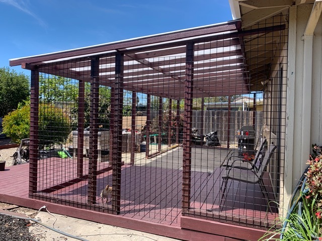 Enclosed patio addition with natural finishes