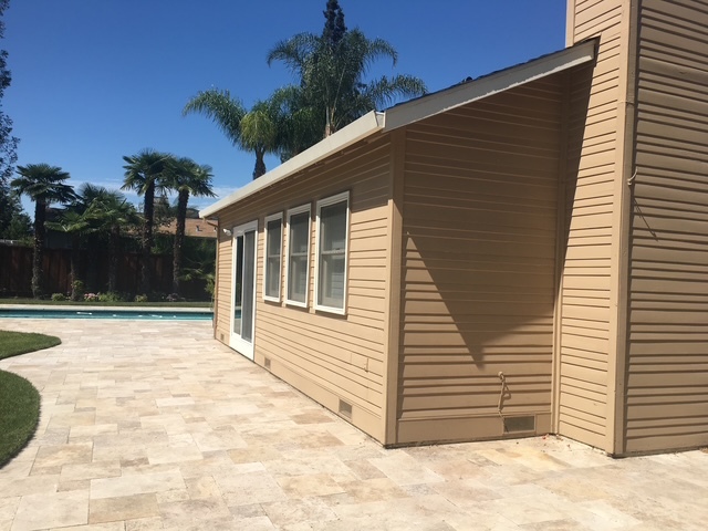 Poolside build with custom hardscape